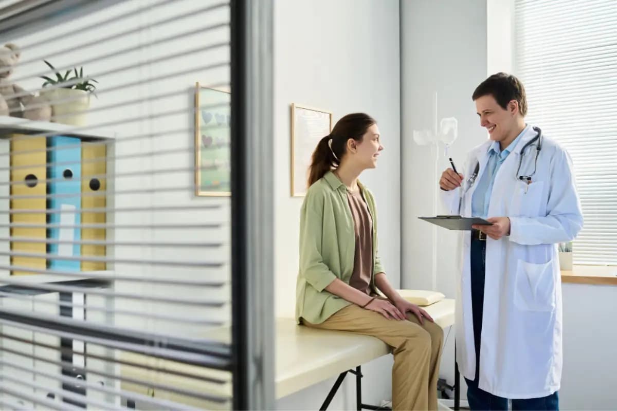 Doctor speaking with a patient during a clinic consultation